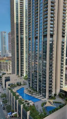 an aerial view of a city with tall buildings at Cozy private master bedroom for solo female in shared home in Dubai