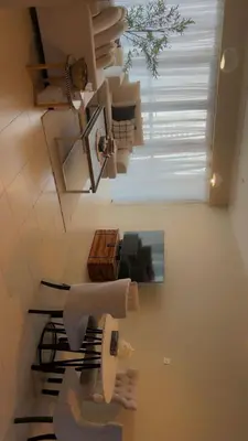 a bathroom with a sink and a mirror at Cozy private master bedroom for solo female in shared home in Dubai