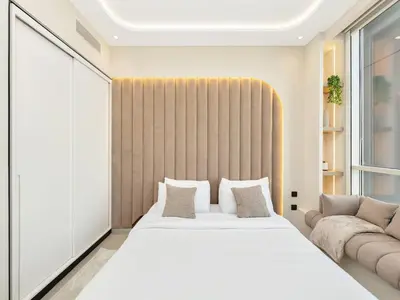 a bedroom with a large white bed and a couch at Stylish 1-Bedroom in Collective 2 - Dubai Hills in Dubai