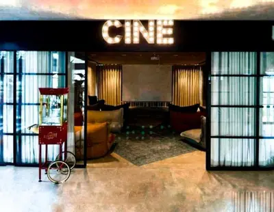 a living room with a lobby with a one sign at Stylish 1-Bedroom in Collective 2 - Dubai Hills in Dubai