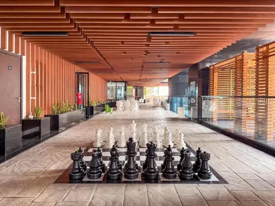 a chess board in the middle of a building with a chessboard at GuestReady - Studio | Stunning Burj Khalifa View in Dubai