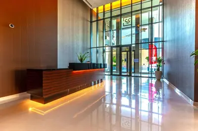 a lobby of a building with a large glass door at Urban 1BR Retreat RP Heights Near Dubai Mall in Dubai