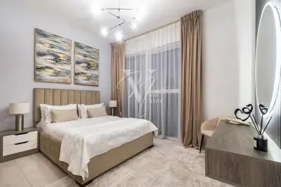 a bedroom with a large bed and a window at La Vie Majestic 2BDR with Private Beach Access in Dubai