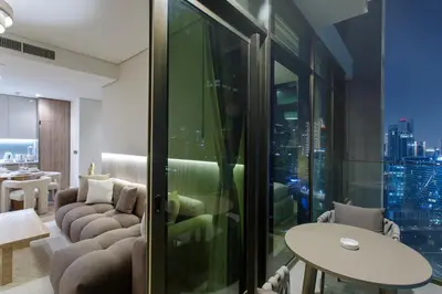 a hotel room with a view of a city at Skyline Escape 2 bedroom with Burj Khalifa View in Dubai
