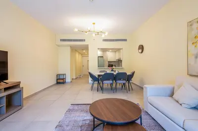 a living room with a couch and a table at Exclusive 2BR in Rahaal 2, Madinat Jumeirah Living in Dubai