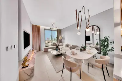 a living room with a table and chairs and a couch at Vida Residences Dubai Mall - Burj Khalifa View, Downtown Dubai in Dubai