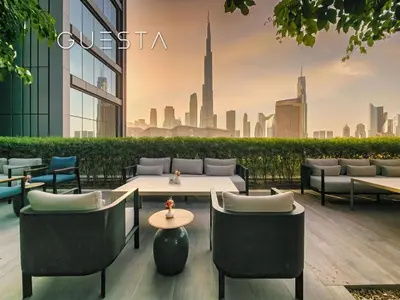 a restaurant with a view of a city skyline at Vida Residences Dubai Mall - Burj Khalifa View, Downtown Dubai in Dubai