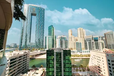 a view of a city with tall buildings and a river at Luxury 5BR Marina View w Private Pool KG1004 in Dubai