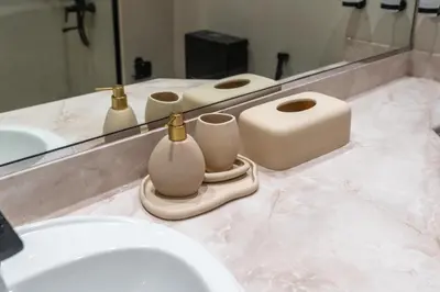 a bathroom counter with a sink and a mirror at White Sage Discovery Gardens Renovated Studio next to Metro in Dubai