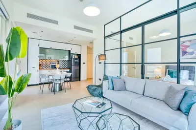 a living room with a couch and a table at PVH - Posh 2BR with 1 Queen Bed Plus 1 Single Bed - Collective 2-0 in Dubai