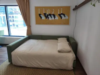 a bedroom with a bed with birds on the wall at Modern 1BR Apartment - Marina Walk in Dubai