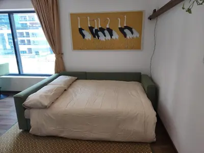 a bedroom with a bed with birds on the wall at Modern 1BR Apartment - Marina Walk in Dubai