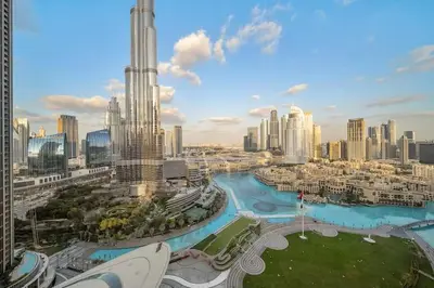 a view of a city with tall buildings at Vogue Downtown Emaar Residence Fashion Avenue with Direct Access to Dubai Mall, Studio Apartment with Balcony Overlooking Burj Khalifa View, Access to all Amenitties in Dubai
