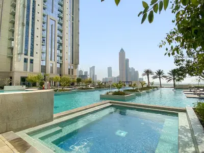 a swimming pool in the middle of a city at ALiving Luxury 1BR Apartment with City View I Amna Tower, Al Habtoor City in Dubai