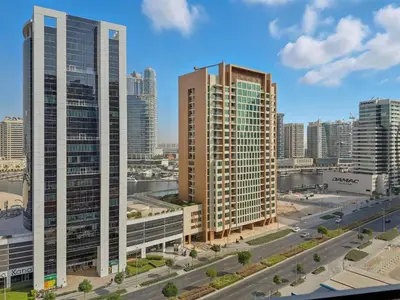 an aerial view of tall buildings in a city at Downtown Dubai, Canal view ,Mag318 in Dubai