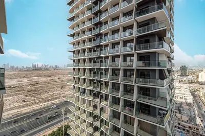 a tall building with balconies on the side of it at 1BR Luxury Stay With Pool, Gym and Skyline View in Dubai