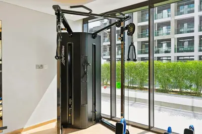 a gym with a large boiler in a building at Estudio Noor en Dubai Por beBalmy in Dubai