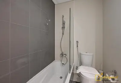 a bathroom with a tub and a toilet and a shower at Luxurious 3BR Villa Getaway in DH2 by Deleguest in Dubai