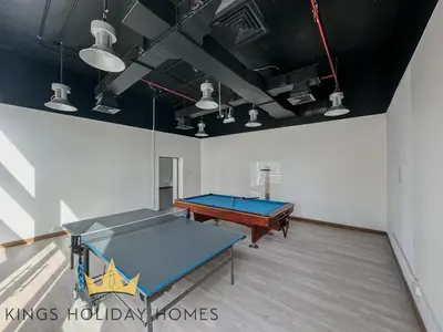 a ping pong room with a ping pong table at Central Park towers residence difc in Dubai