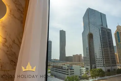 a view of a city skyline with a building at Central Park towers residence difc in Dubai