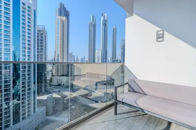 a balcony with a view of a city at TRPS - MAG 318, Business Bay - Spacious Studio, Furnished, Close to Dubai Mall in Dubai
