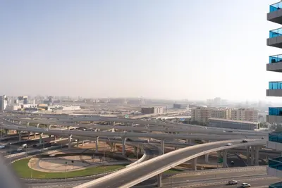 an overhead view of a highway in a city at Escape24 Elegant 1BR with Marina Views, Dubai Marina in Dubai