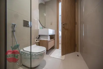 a bathroom with a toilet and a shower in it at Beautiful Brand New Spacious in Dubai