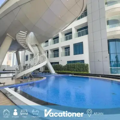 Vacationer I Premium Studio I Pool & Gym Access I Near Miracle Garden I Opalz Tower 2