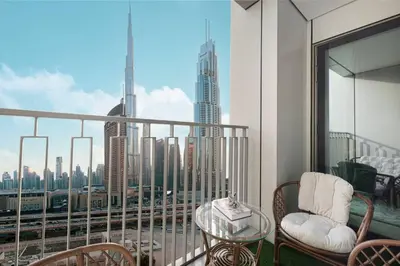 a balcony with a view of a city skyline at Luxury 2 bedroom with Burj Khalifa view, connected to Dubai Mall in Dubai