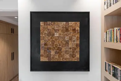 a painting of a stone wall on a wall at Palmoral Collection Stunning Studio with Dining Area in Dubai