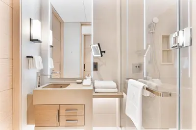 a bathroom with a sink and a mirror at Luxury 3 bedroom Apartment Full Sea & Ain Dubai View Address JBR in Dubai