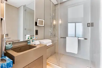 a bathroom with a sink and a shower at Luxury 3 bedroom Apartment Full Sea & Ain Dubai View Address JBR in Dubai