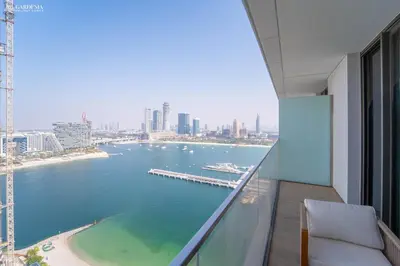 a view of the ocean from a balcony of a building at Lush Apartment - Private Beach Emaar - Beachfront in Dubai