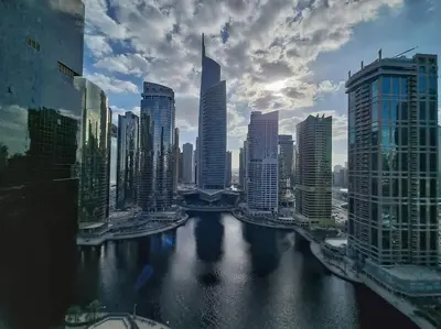 a view of a city with a river and buildings at Studio at Dubai Arch 2005 in Dubai