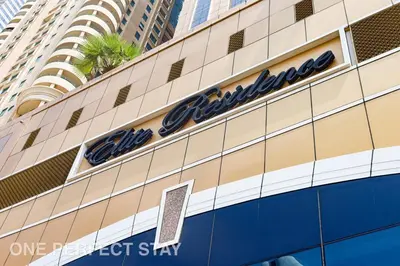 a sign on the side of a building at 1BR Elite Residence4304 in Dubai