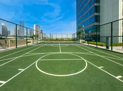 an empty basketball court on the roof of a building at Downtown with Direct Access Dubai Mall & Burj Khalifa in Dubai