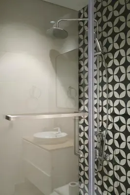 a bathroom with a shower and a sink at Designed 2BR in Socio Dubai Hills in Dubai