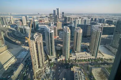 an aerial view of a city with tall buildings at Stunning 1 Bedroom Panoramic Views at Burj Royale in Dubai