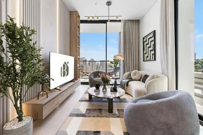a living room with a couch and a table at BLVD Luxury 2BHK with Private Pool Near Circle Mall in Dubai