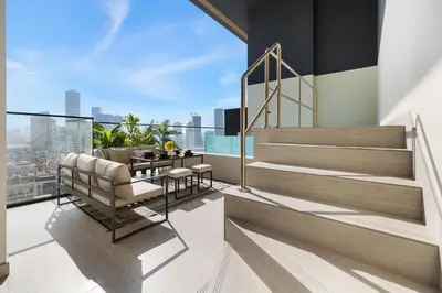 a balcony with a view of a city at BLVD Luxury 2BHK with Private Pool Near Circle Mall in Dubai
