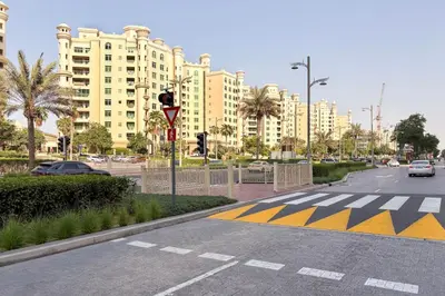 an empty street in a city with tall buildings at Blueground The Palm Jumeirah pool nr Atlantis DXB-1719 in Dubai