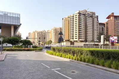 an empty street in a city with tall buildings at Blueground The Palm Jumeirah pool nr Atlantis DXB-1719 in Dubai