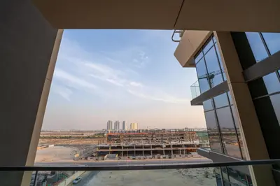a view from the window of a building at EasyGo - Chic Studio Escape in Dubai Sports City in Dubai