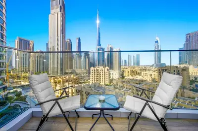 a balcony with a view of a city skyline at Premium 2BR at Imperial Avenue overlooking Burj Khalifa in Dubai