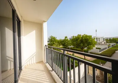 a balcony with a view of a building at Luxury Maple 3 Villa in Dubai Hills with Private Garden in Dubai
