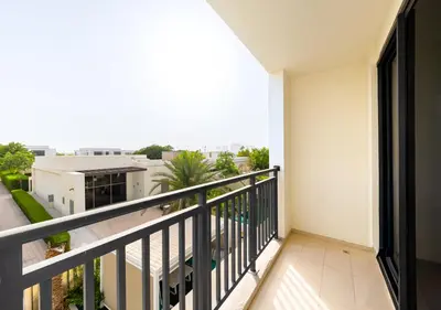 a balcony with a view of a building at Luxury Maple 3 Villa in Dubai Hills with Private Garden in Dubai