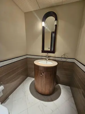 a bathroom with a sink and a mirror at Apartment in the heart of Dubai - in Burj Khalifa in Dubai