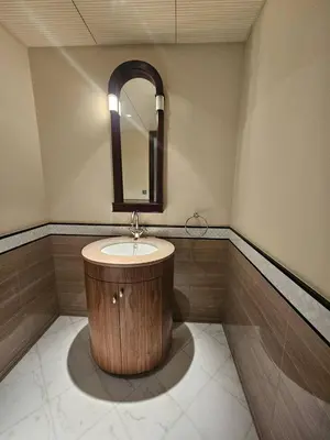 a bathroom with a sink and a mirror at Apartment in the heart of Dubai - in Burj Khalifa in Dubai