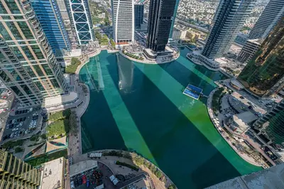 an aerial view of a river with tall buildings at Luxury JLT Studio Lakeview Near Metro & Marina in Dubai