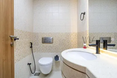 a bathroom with a sink and a toilet at Luxury Condo 3 BR in Dubai Marina Sulafa 4004 in Dubai